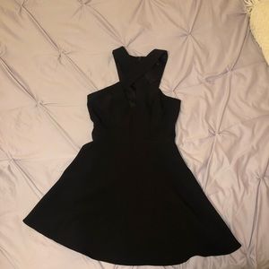 Black razor back peplum dress